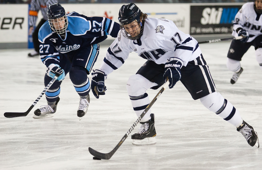 2 college Ice Hockey players.