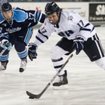 2 college Ice Hockey players.